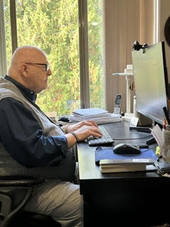 At the writing desk